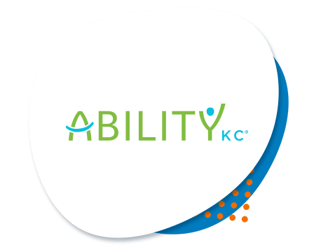 Ability KC Logo. Green Anility with Blue KC. The Y in abilty has a dot to look like ahead with arms raised