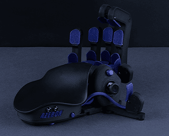 An Azeron One-handed controller. There is a palm wrist and multiple finger switches. The is a small joystick attached to the side.