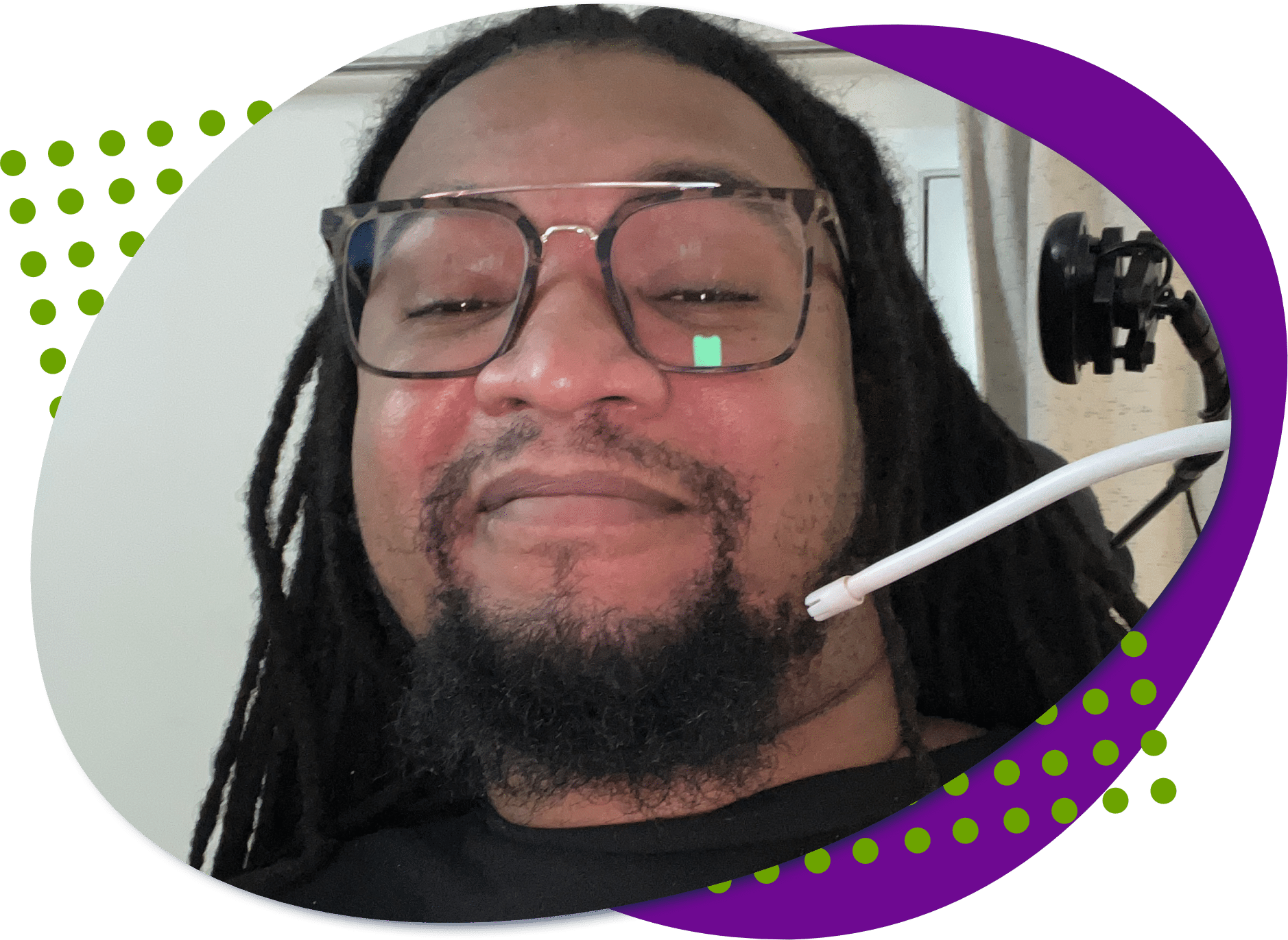 brandon stack2 A photo of Brandon, a young man, he has black hair and a beard and he is wearing glasses