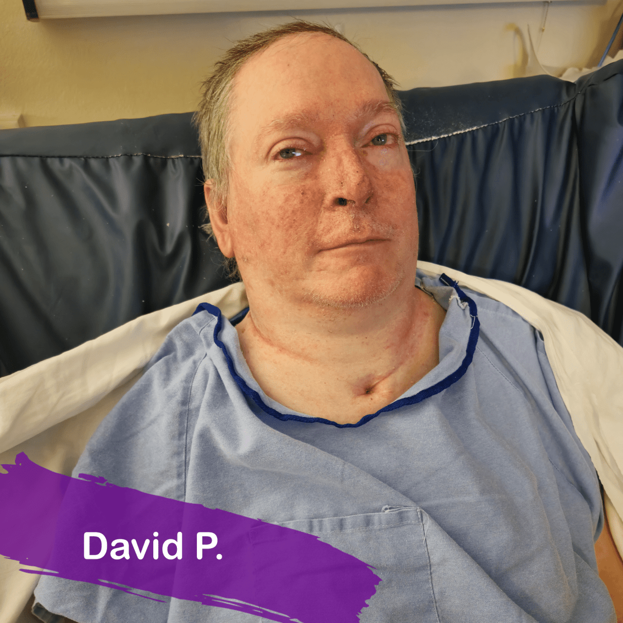 A photo of David, he has short blonde hair and is wearing a blue shirt.