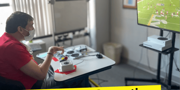 A photo of an individual playing a football video game using adaptive gaming equipment and text that says 'Exploring the Connection Between Gaming and Physical Rehabilitation'