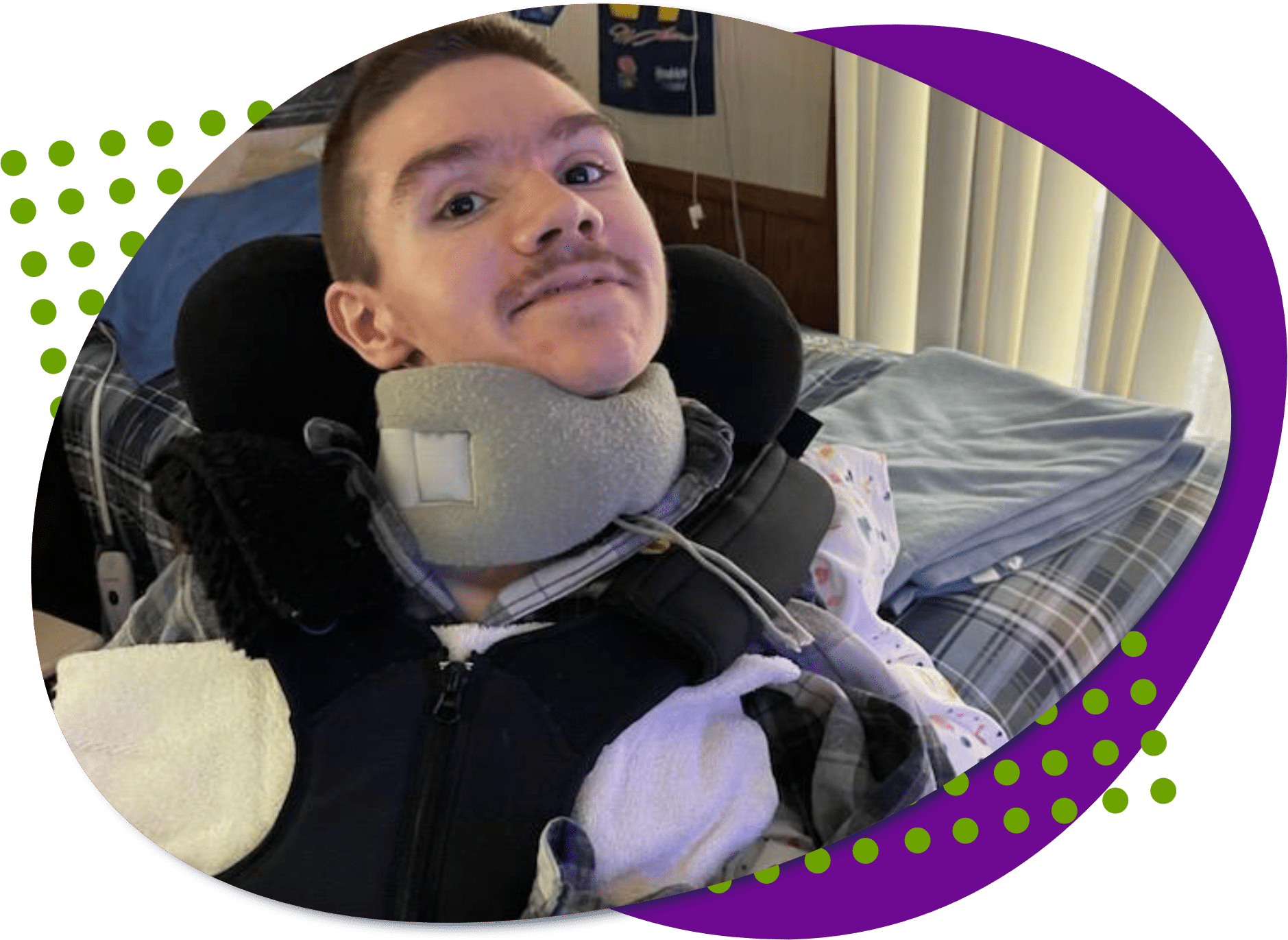 Jonathan stk A photo of Jonathan, he has short dark brown hair and brown eyes, he is wearing a grey plaid shirt and he is smiling.