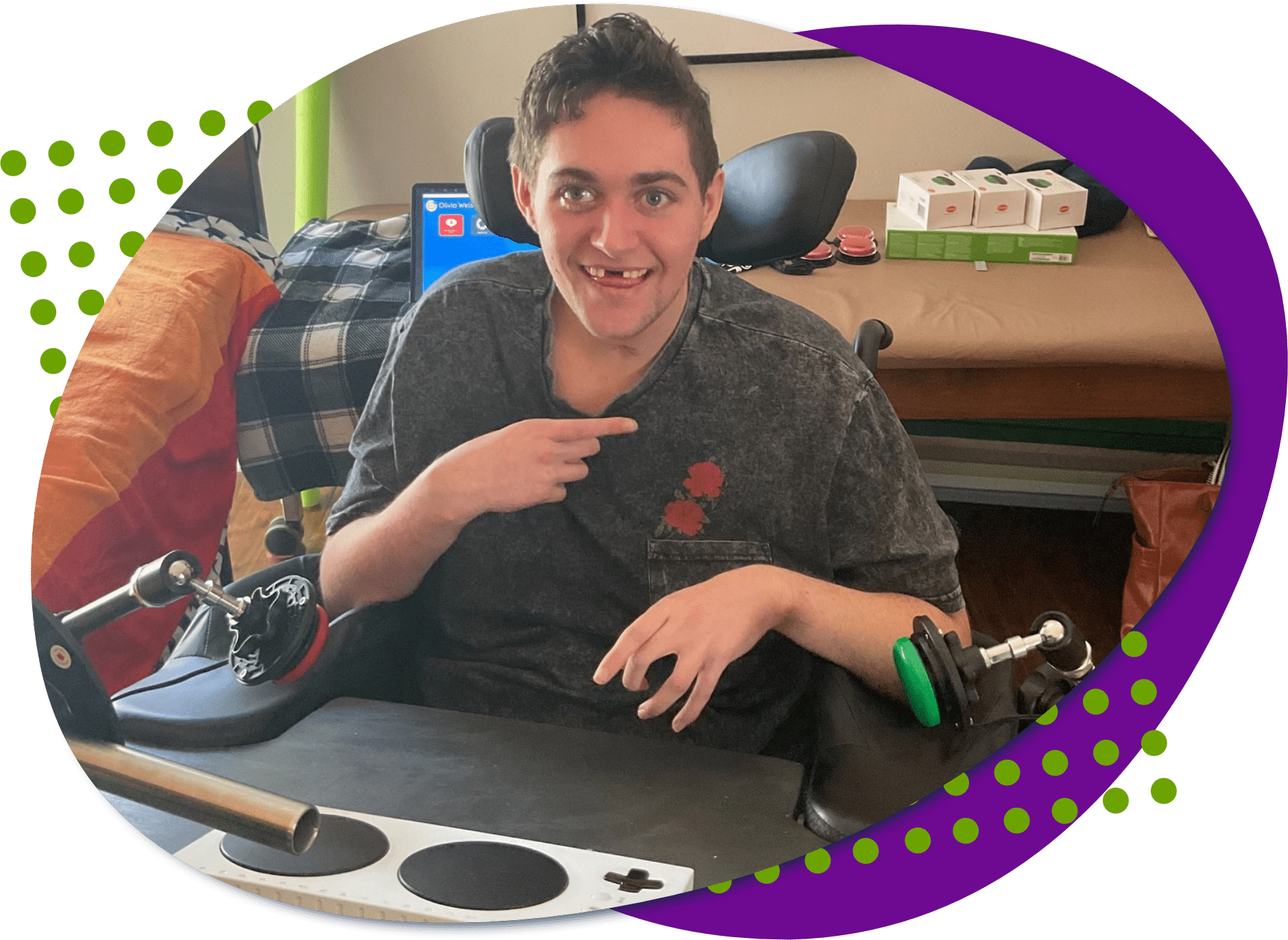 A photo of Oliver with some of his gaming adaptive gaming equipment.